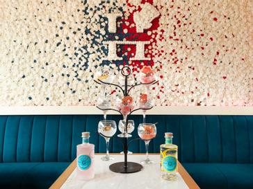 HYDE Hotel | Galway | flower wall in HYDE bar Galway with drinks tree in front