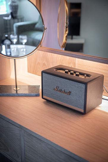 HYDE Hotel | Galway |  Stylish Marshall speaker on a wooden vanity beside a modern round mirror with a marble base